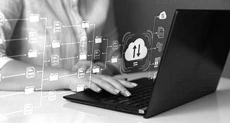 Typing on a laptop