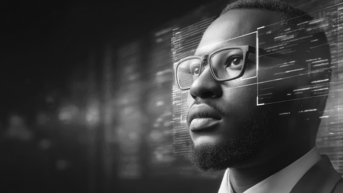 A cybersecurity technician running a scan of the organizations network using automated vulnerability management software to detect abnormalities.