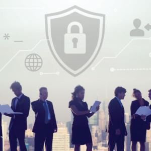 people looking at papers with security logo