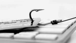 a fish hook stealing a credit card