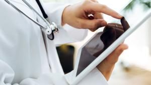 Health Care Professional using tablet 